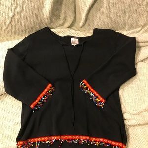 Silk blend medium weight sweater.